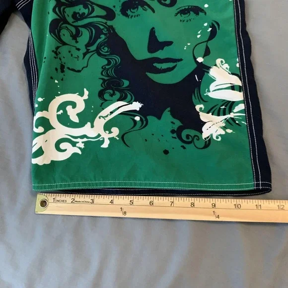 Genesis Surf Board Shorts Mens 34 Green Floral Face Graphic Swim Trunks Beach - Picture 7 of 10